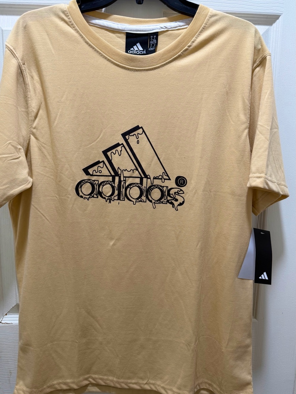 adidas Men’s Sand Graphic Logo Short Sleeve Tee